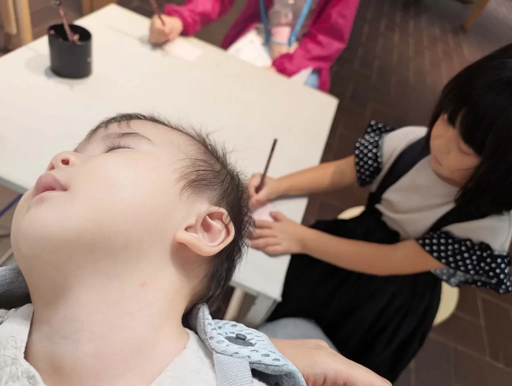 すやすや寝ている0歳の女の子